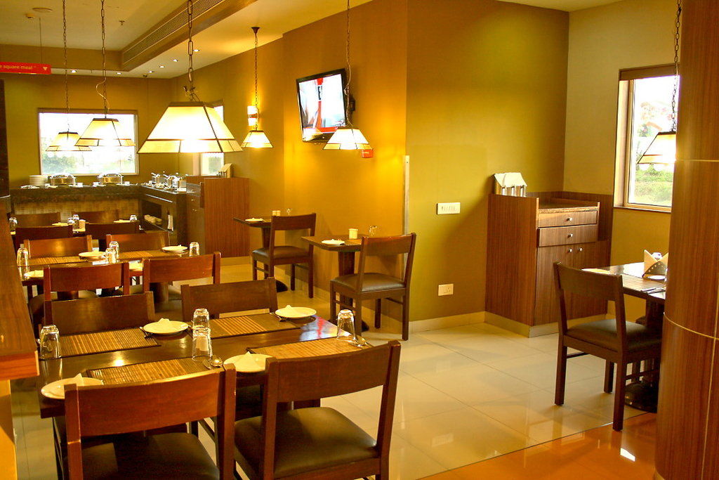 浦那瓦卡达金杰酒店 餐厅 照片