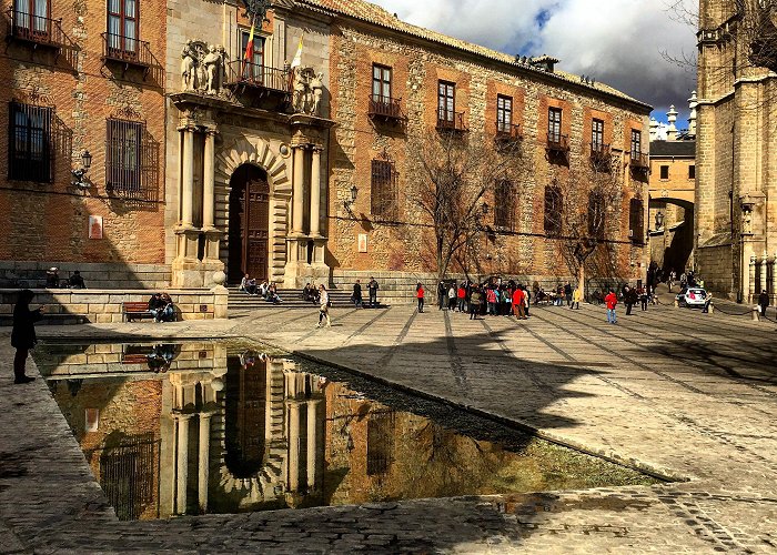 Palacio arzobispal Palacio Arzobispal reflejado en la fuente de Cristina Iglesias en ... photo