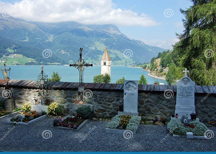 Lake Resia Lake Resia bell tower editorial photography. Image of village ... photo