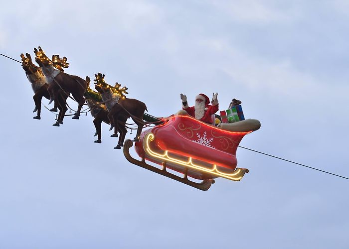 Montreux Christmas Market Montreux Noël - The Market Place and Santa Claus on his flying sleigh photo
