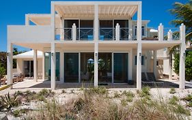 Aqua Del Rose 2 Bedroom Beachfront Cottage Long Bay Exterior photo