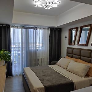 Skycourt Suites At Azure North Pampanga Condominium Exterior photo